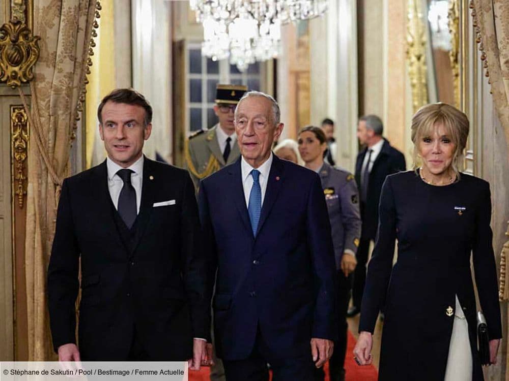 Loin de ses robes minimalistes, Brigitte Macron surprend dans une robe noire à fente doublée et ornée de bijoux marins, pour un dîner d’État à Lisbonne