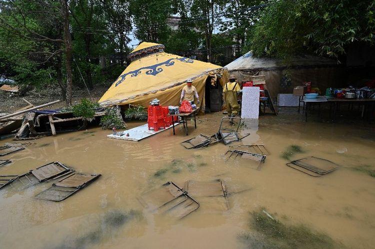 Inondations en Chine: de nouvelles pluies violentes prévues, les victimes engagées dans un contre-la-montre